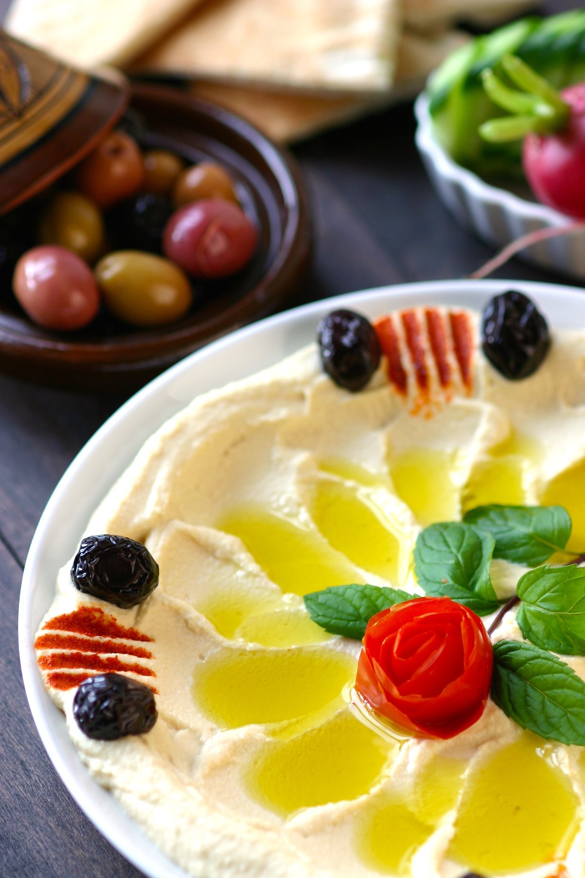 A simple recipe for an authentic, Basic Hummus. Creamy and satisfying, this hummus is perfect as an anytime snack and also makes great party food.