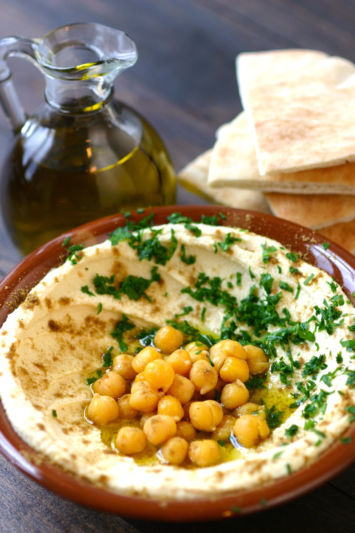 A simple recipe for an authentic, Basic Hummus. Creamy and satisfying, this hummus is perfect as an anytime snack and also makes great party food.