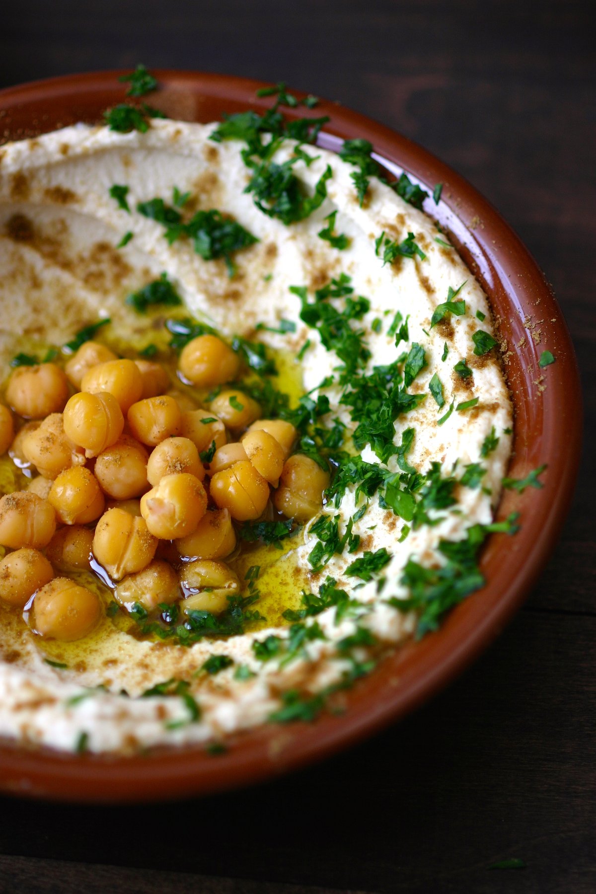 A simple recipe for an authentic, Basic Hummus. Creamy and satisfying, this hummus is perfect as an anytime snack and also makes great party food.