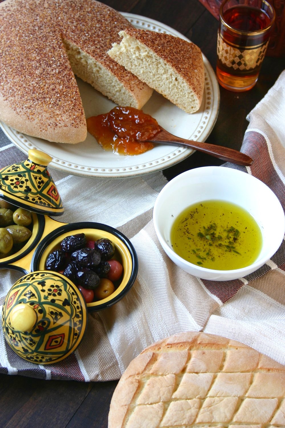 A simple recipe for traditional Moroccan Bread - Khobz Kesra. Hearty and versatile, this bread can be made with white or whole wheat flour.