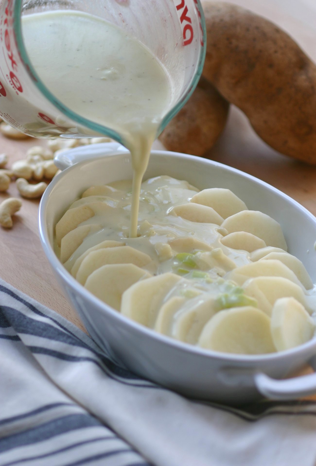 A rich and creamy recipe for Vegan Scalloped Potatoes. This non-dairy, cashew-based version is a real crowd pleaser.