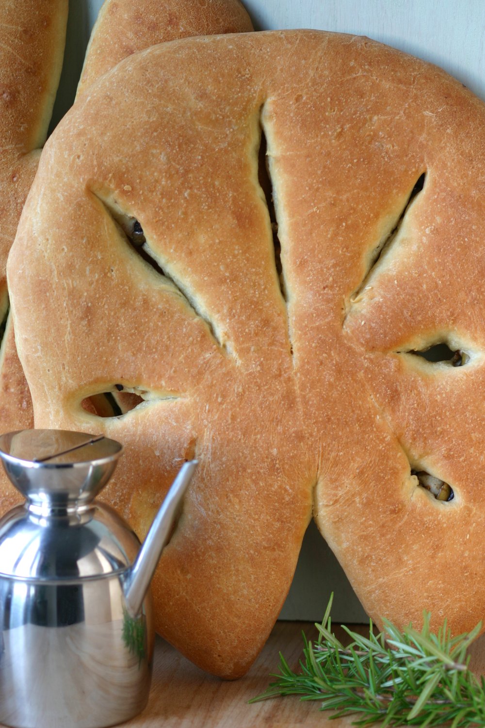 This recipe for Fougasse, a traditional Provençal bread, is crispy, crusty, and stuffed with olives and herbs.
