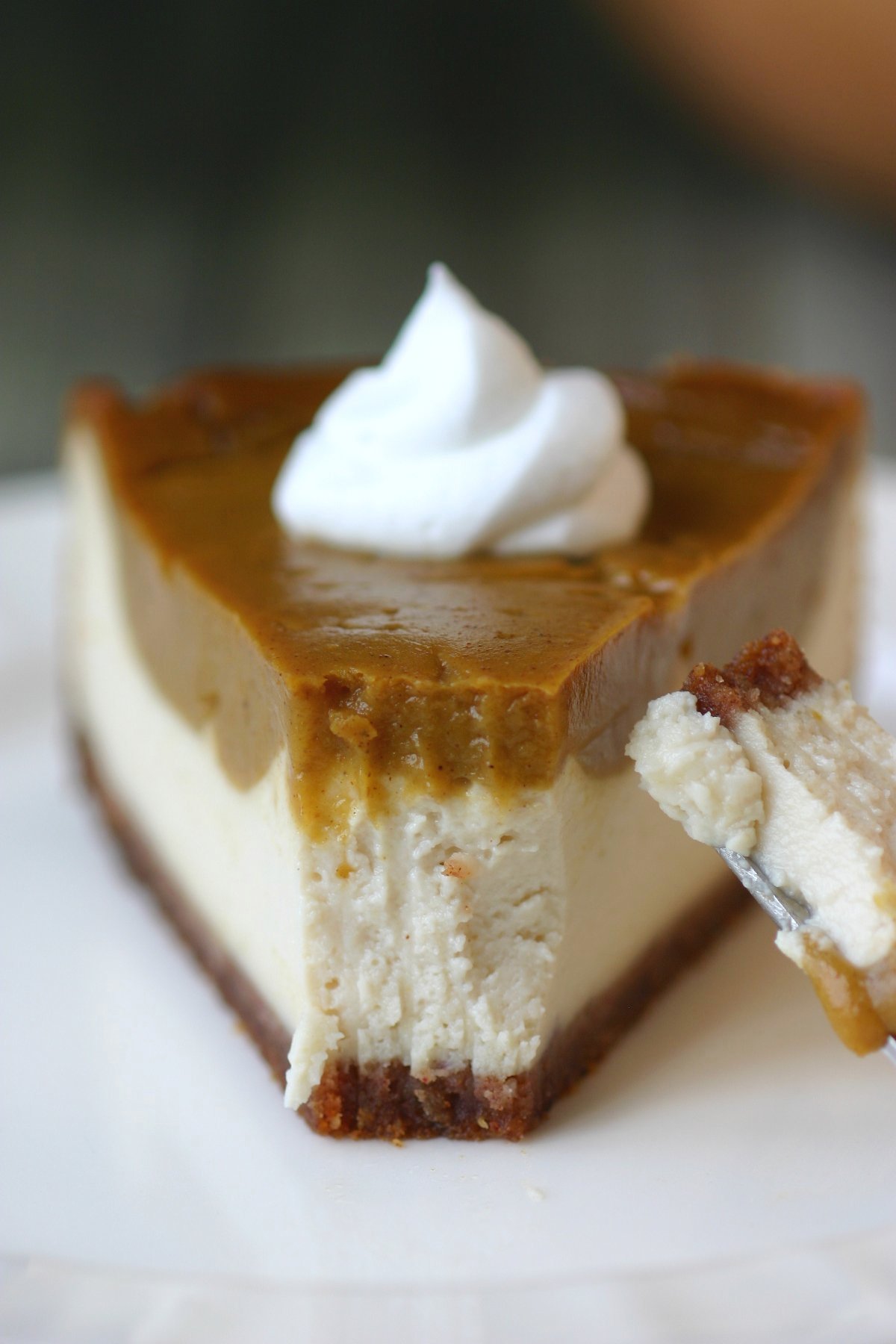 This recipe for Vegan Pumpkin Pie Cheesecake combines two of your favorite desserts to create one smooth, spiced, and rich sight to behold.