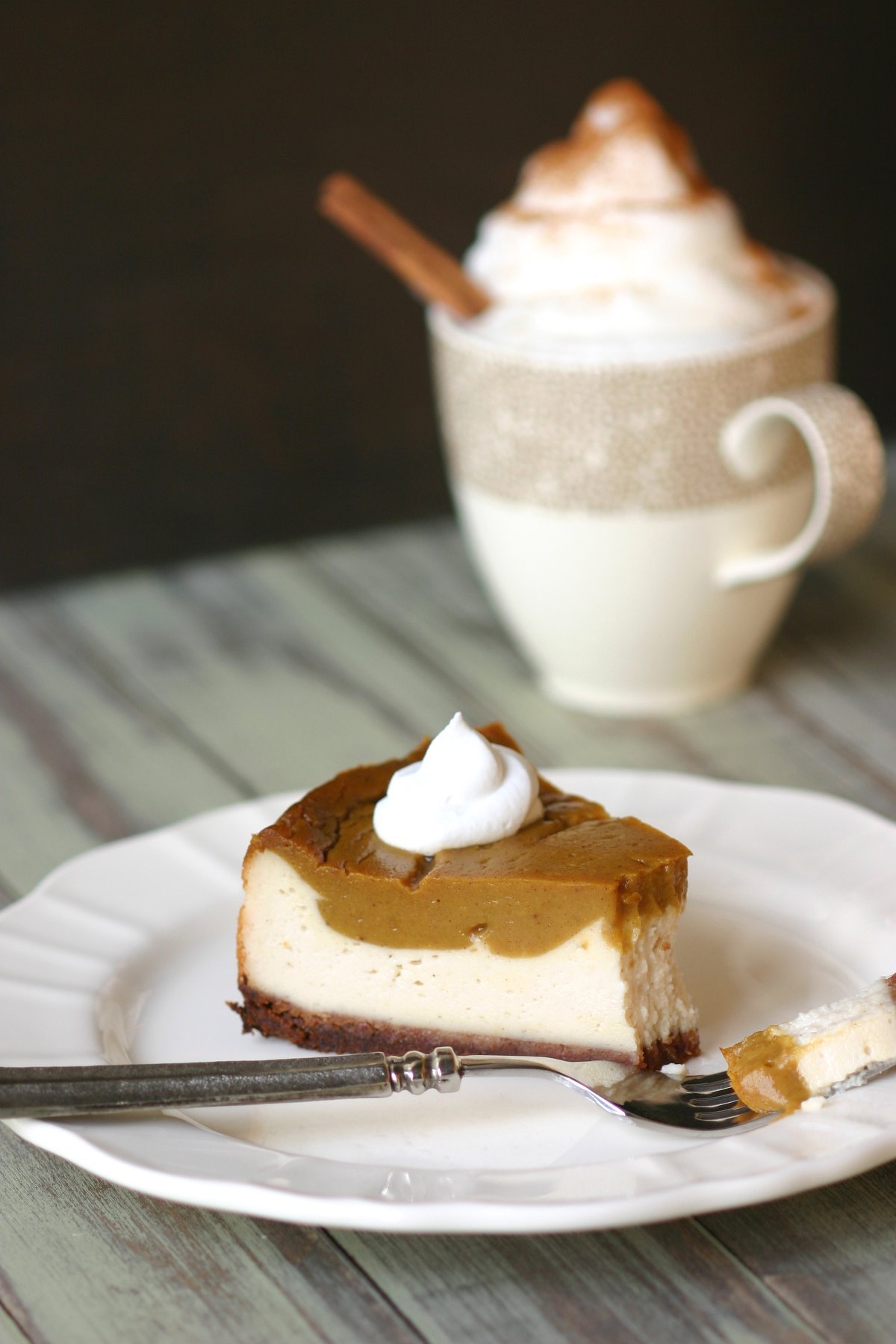 This recipe for Vegan Pumpkin Pie Cheesecake combines two of your favorite desserts to create one smooth, spiced, and rich sight to behold.
