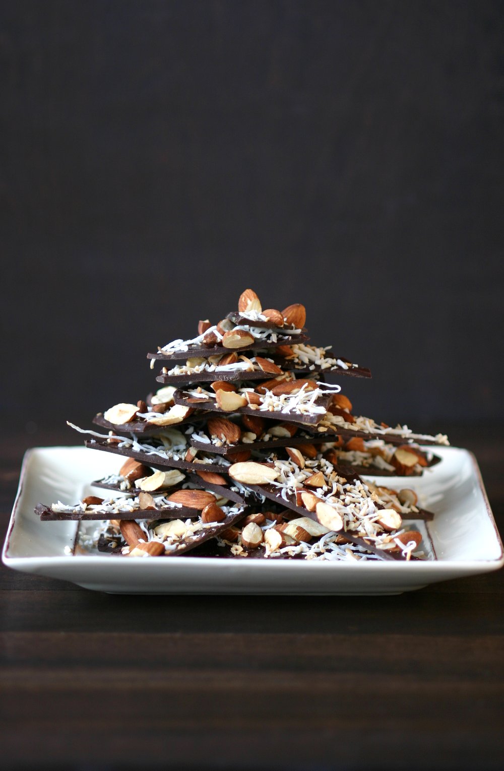 A recipe for Chocolate Bark that can be made quickly with minimal ingredients. Nuts, seeds, fruits, spices, herbs, and teas are all great toppings.