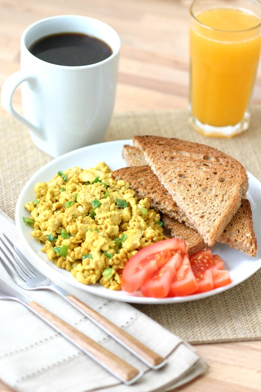 This flavorful Basic Tofu Scramble is simply delicious and can be endlessly adapted to your liking with different veggies, herbs, and spices.