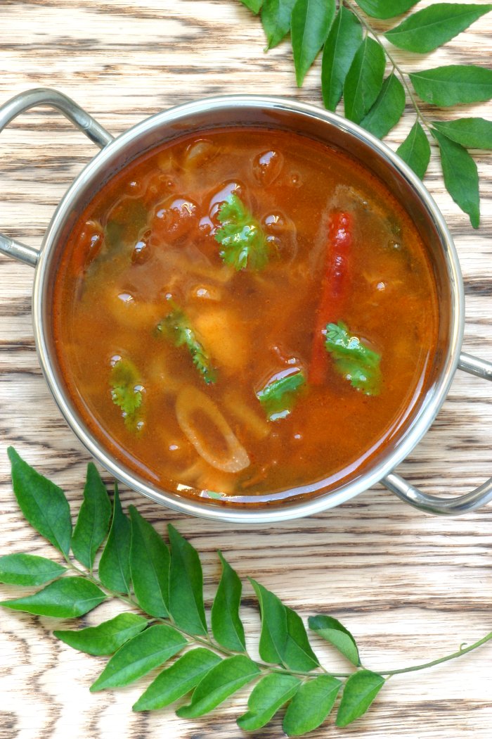 Hot, spicy, and tangy, Tomato Rasam is a quintessential South Indian dish featuring spices, chiles, and tamarind. Serve it as a soup or with rice.