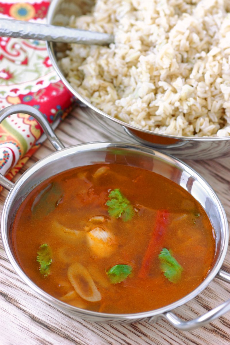 Hot, spicy, and tangy, Tomato Rasam is a quintessential South Indian dish featuring spices, chiles, and tamarind. Serve it as a soup or with rice.