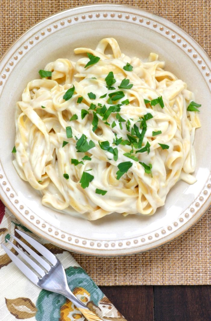 Rich, creamy, cheesy, and nondairy! This Vegan Fettuccine Alfredo is a crowd-pleasing dish for pasta lovers of all ages.