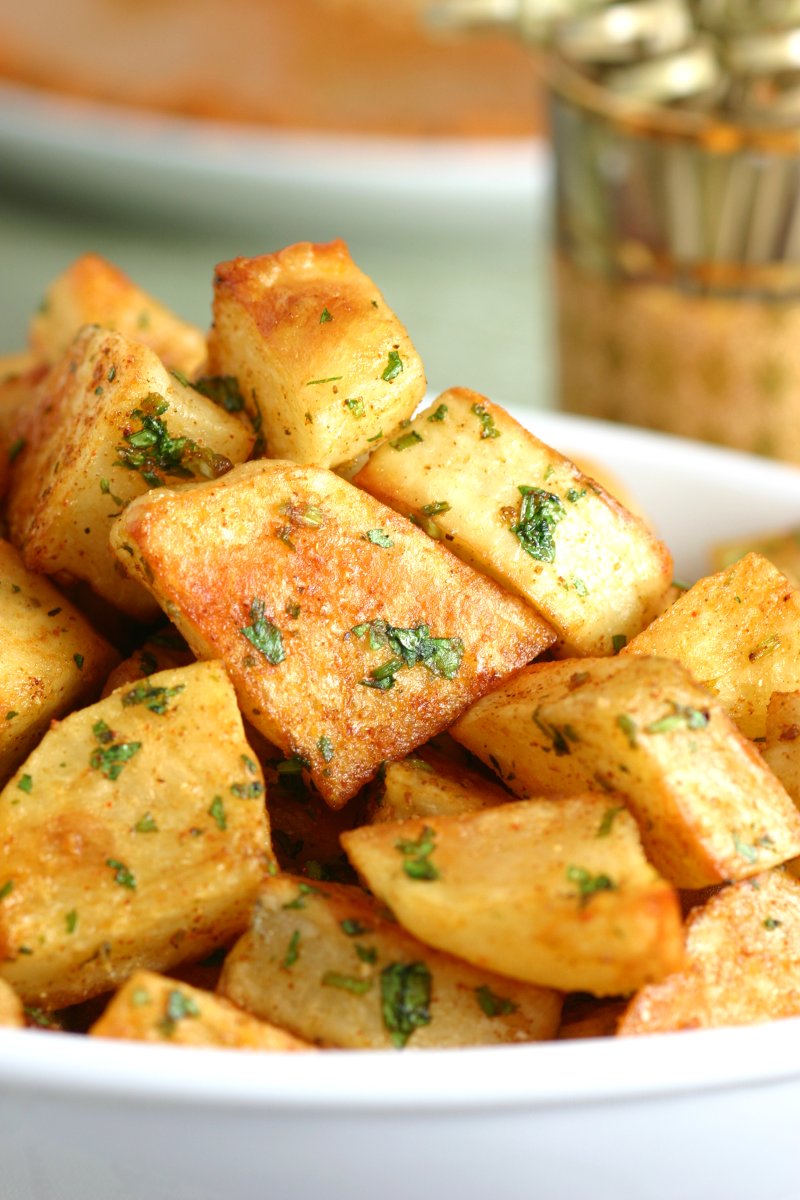 An easy to make recipe for Spicy Lebanese-Style Potatoes (Batata Harra). These spiced potatoes are a flavorful appetizer, side dish, or party snack.