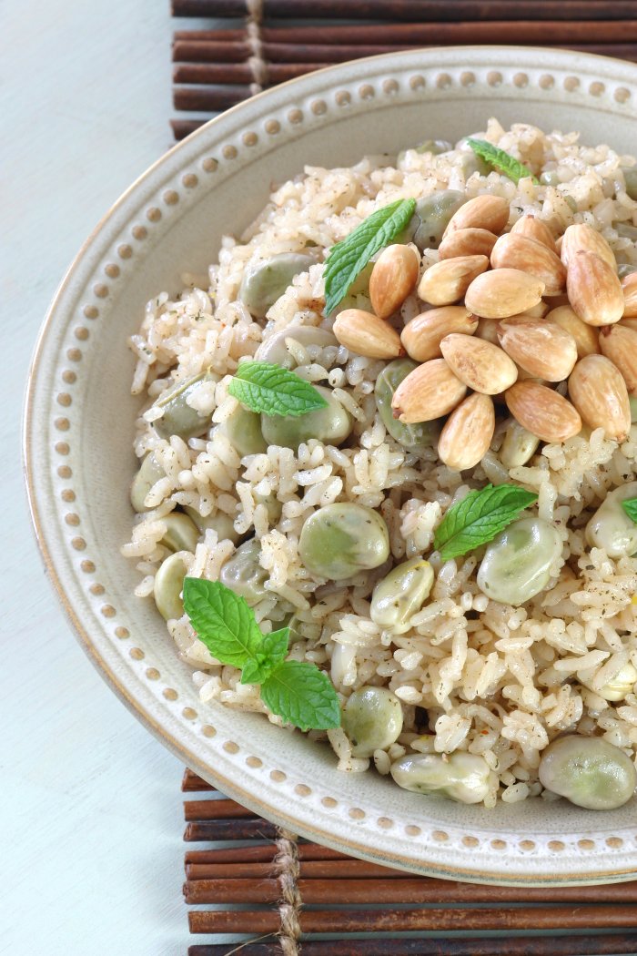 A springtime Fava Bean Rice Pilaf featuring creamy favas, authentic spices, and toasted almonds—and done in only 30 minutes!