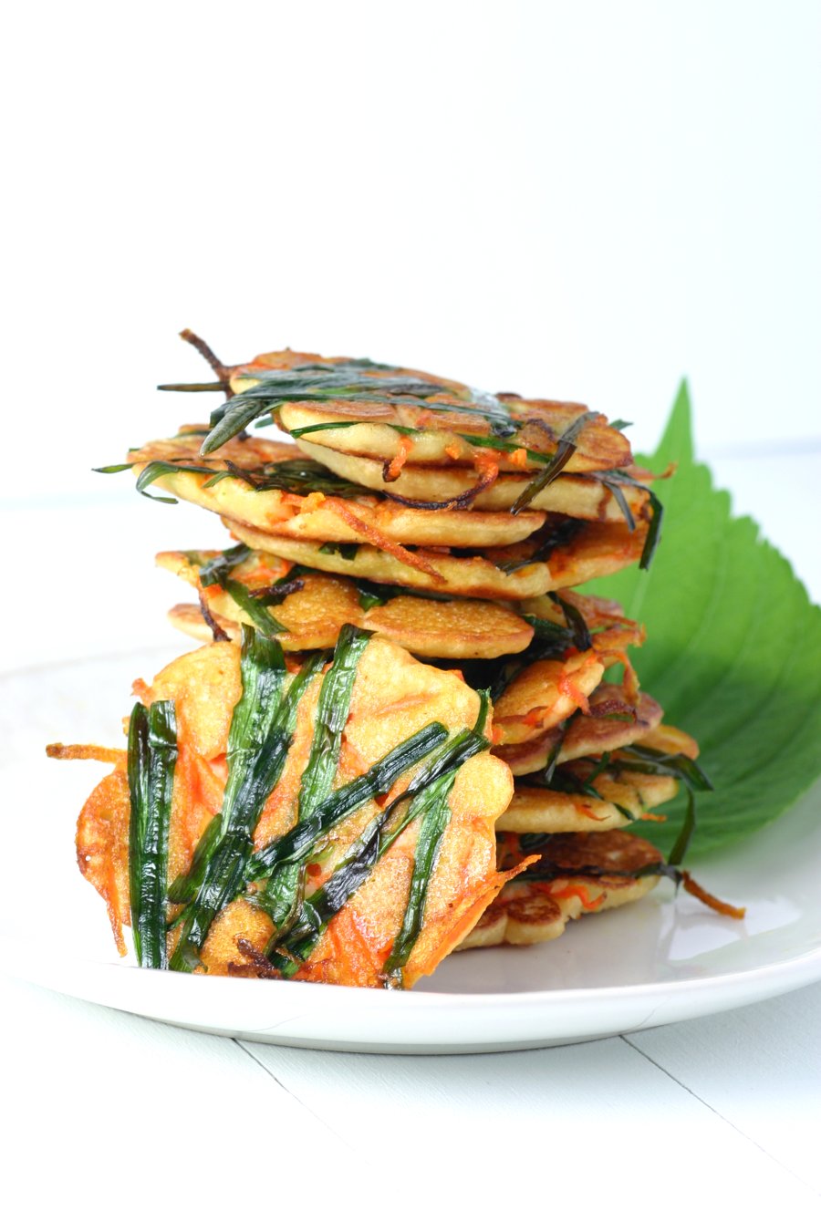 Gluten-free and vegan, these savory Korean Mung Bean Pancakes are chewy in the middle and crisp on the edges.