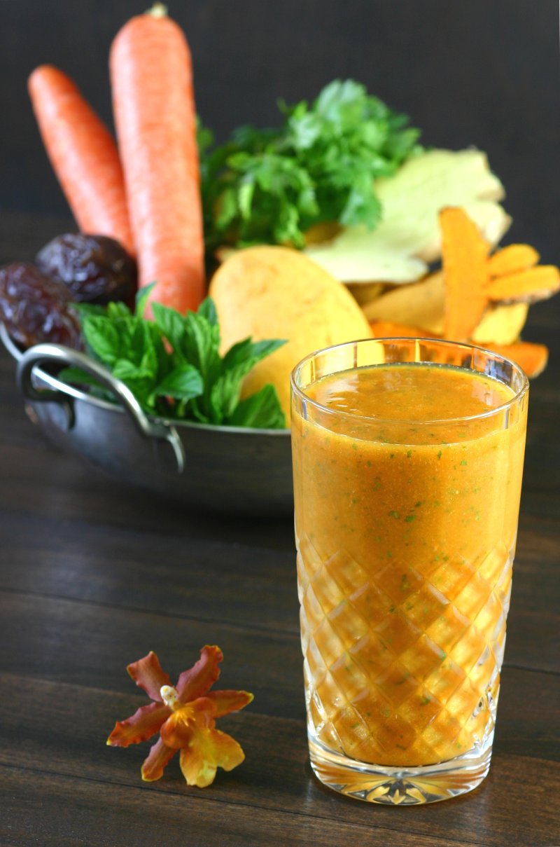 Mangos, carrots, and fresh turmeric combine with refreshing herbs to create this brilliantly-hued Mumbai Smoothie.
