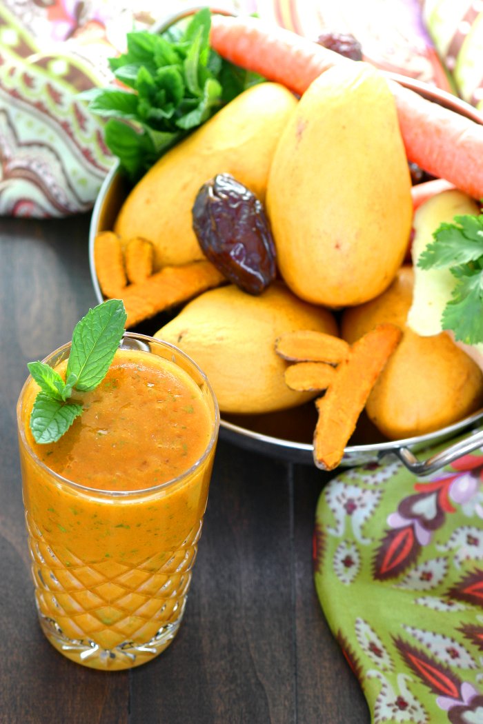 Mangos, carrots, and fresh turmeric combine with refreshing herbs to create this brilliantly-hued Mumbai Smoothie.
