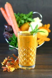 Mangos, carrots, and fresh turmeric combine with refreshing herbs to create this brilliantly-hued Mumbai Smoothie.