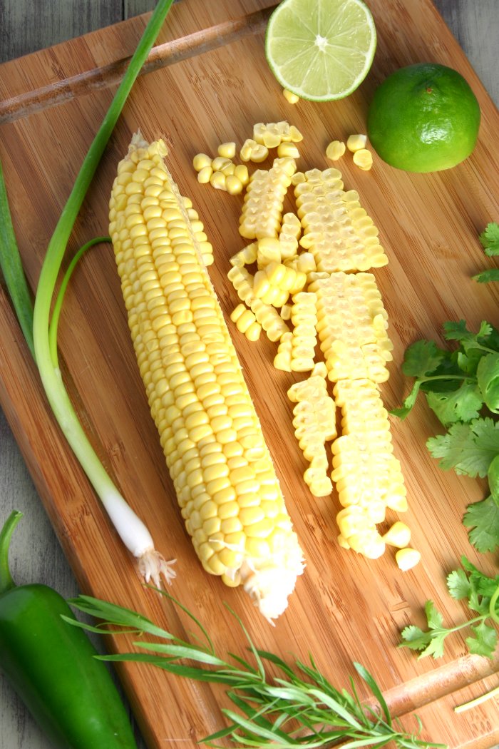 Sweet, tart, and herbaceous, this recipe for Raw Corn Salad will soon be one of your favorite ways to use fresh summer corn!