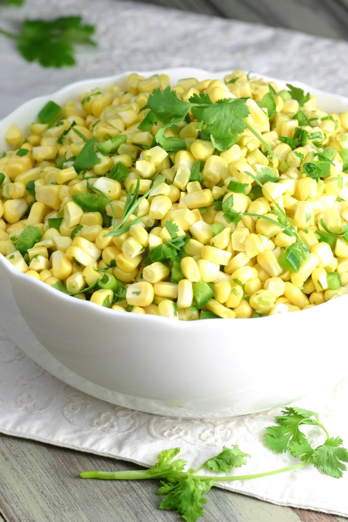 Sweet, tart, and herbaceous, this recipe for Raw Corn Salad will soon be one of your favorite ways to use fresh summer corn!