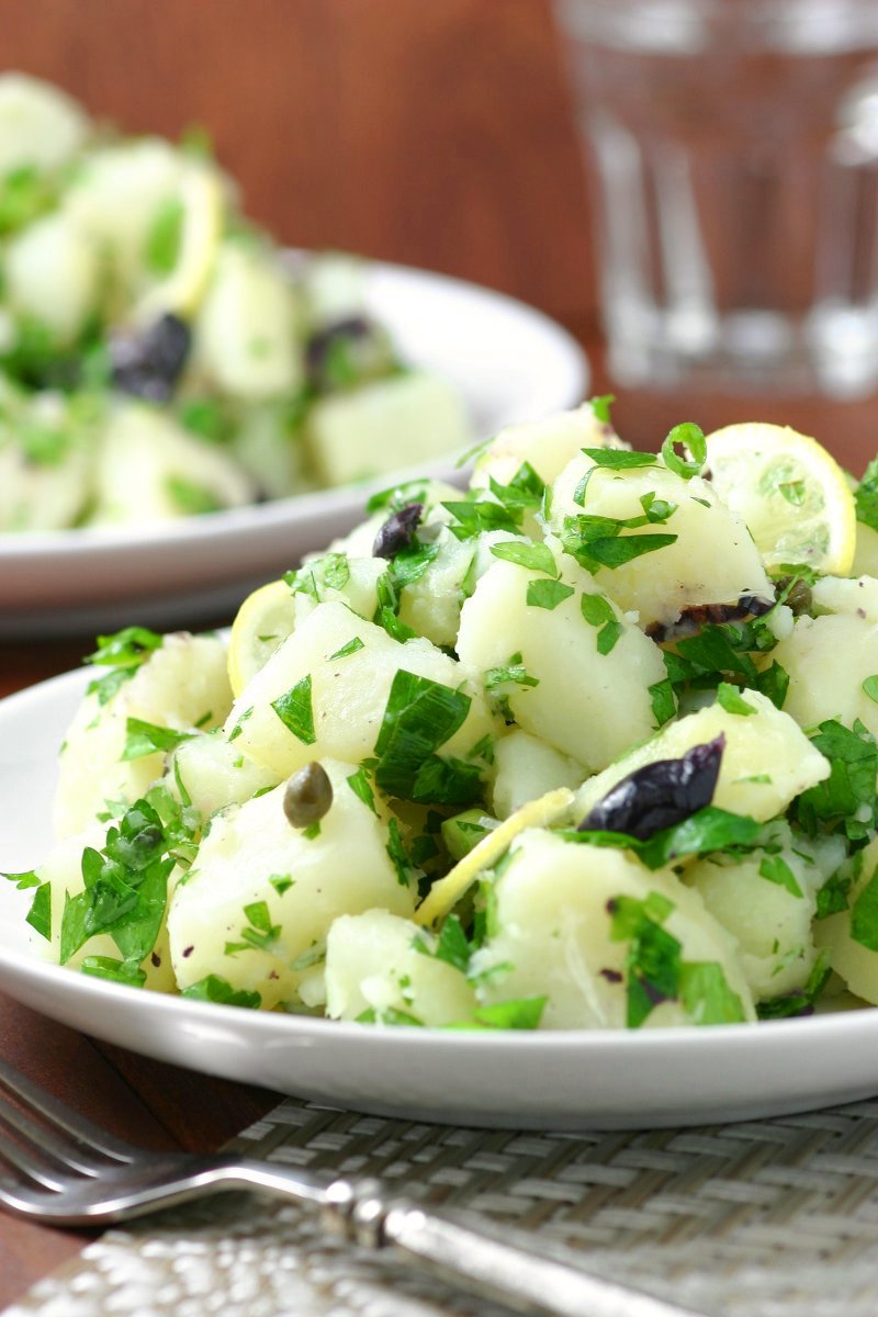 This Lemony Potato Salad is a change from the ordinary. It's tangy, herbaceous, and, thanks to the olives and capers, has little pops of flavor throughout.