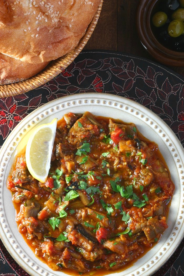 This warm Moroccan Eggplant Salad (Zaalouk) combines cooked eggplant, tomatoes, and classic spices and is enjoyed as a side or alone with lots of bread.
