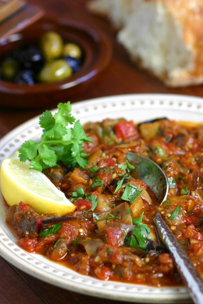 This warm Moroccan Eggplant Salad (Zaalouk) combines cooked eggplant, tomatoes, and classic spices and is enjoyed as a side or alone with lots of bread.