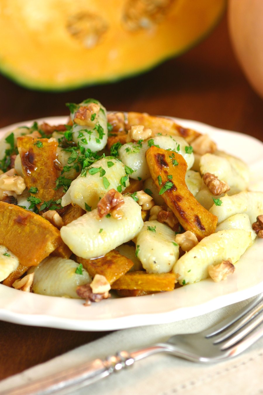 Gnocchi with Roasted Pumpkin and Walnuts is a hearty pasta entrée with Fall flavors and a fluffy texture.