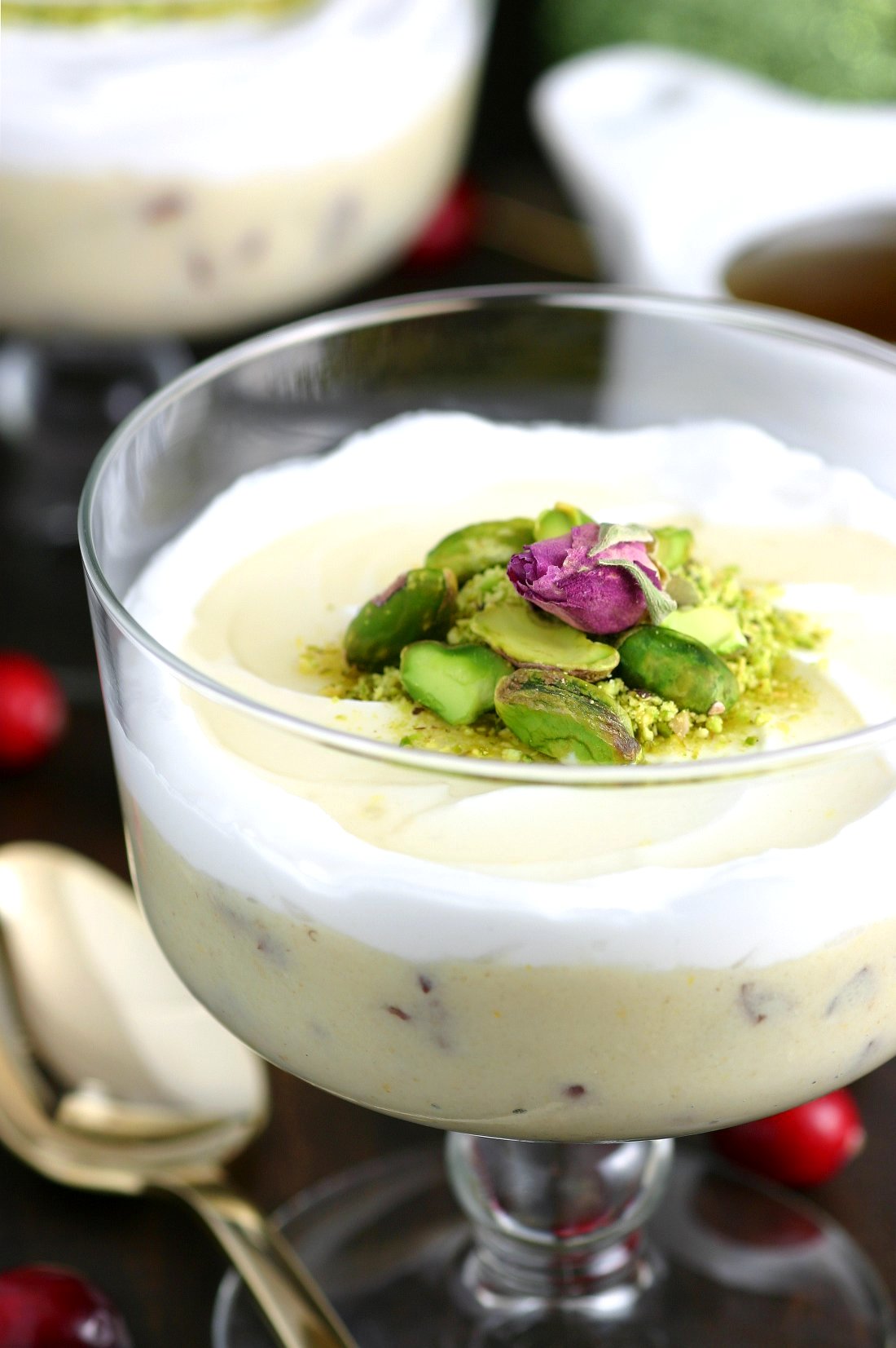 A very popular dessert throughout the Middle East, this Lebanese Semolina Pudding (Layali Lubnan) includes sweet-tart cranberries, thick coconut cream, ground pistachios, and a floral-scented syrup. This vegan recipe can be whipped up quickly, then it chills in the fridge until you are ready to dig in.