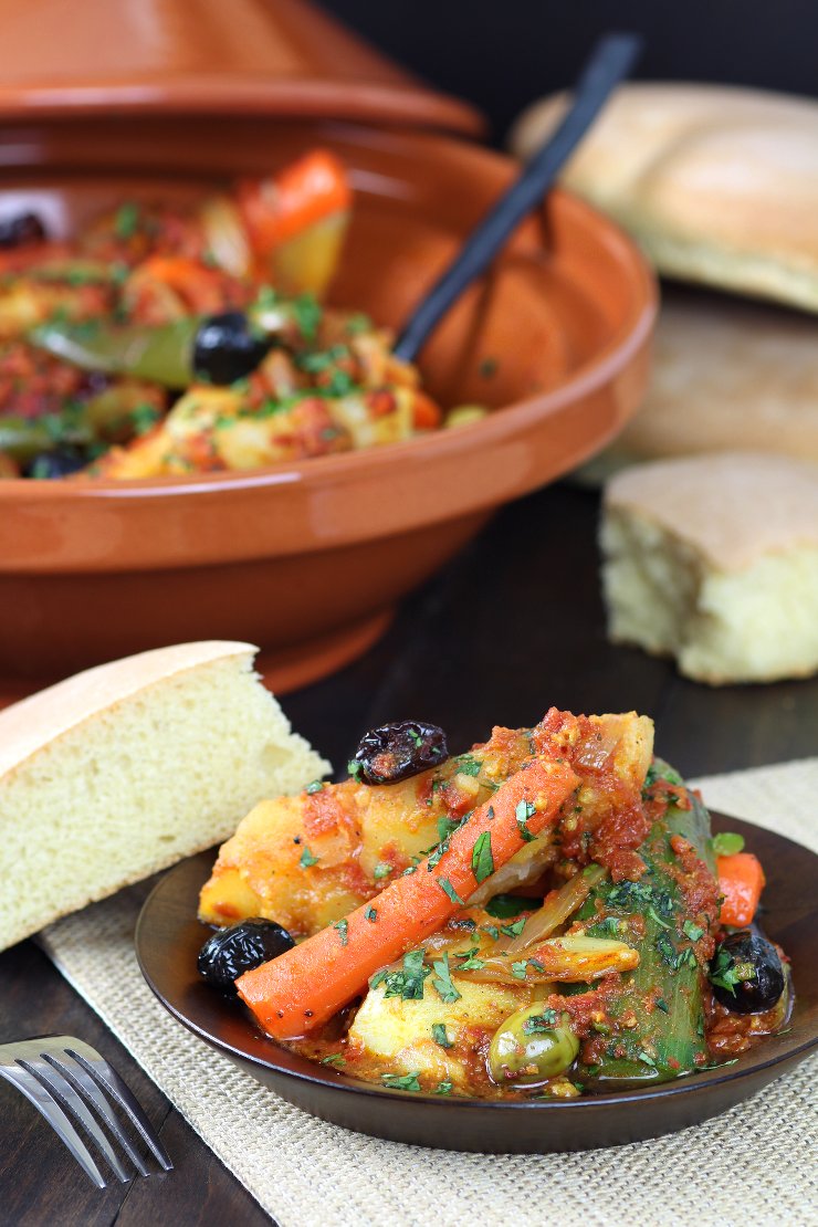 Vegetables are stewed in an aromatic tomato sauce until succulent and tender in this recipe for Simple Vegetable Tagine. Clay pot optional!