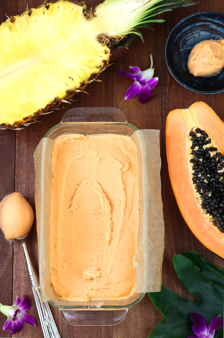 Fragrant tropical fruit blended with creamy coconut milk creates this sweet, cool, and refreshing Papaya Pineapple Sherbet.