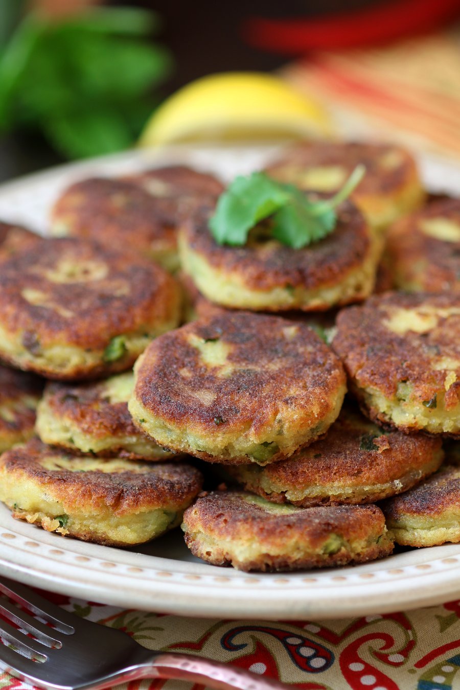 Spiced Potato Patties (Aloo Tikki) are a crisp and tender Indian street food snack that you can recreate in your kitchen.