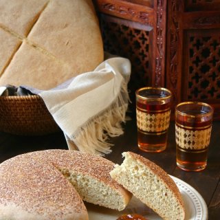 A simple recipe for traditional Moroccan Bread - Khobz Kesra. Hearty and versatile, this bread can be made with white or whole wheat flour.