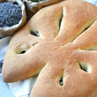 This recipe for Fougasse, a traditional Provençal bread, is crispy, crusty, and stuffed with olives and herbs.