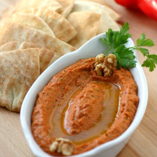 A classic recipe for Muhammara, a roasted red pepper spread with a spicy, sweet, tangy, garlicky, and smoky flavor.