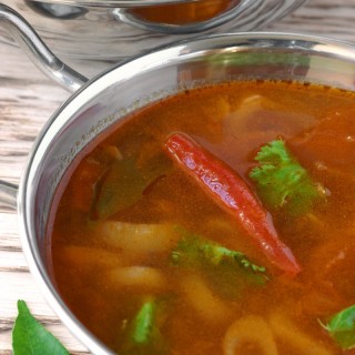 Hot, spicy, and tangy, Tomato Rasam is a quintessential South Indian dish featuring spices, chiles, and tamarind. Serve it as a soup or with rice.