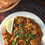 This warm Moroccan Eggplant Salad (Zaalouk) combines cooked eggplant, tomatoes, and classic spices and is enjoyed as a side or alone with lots of bread.