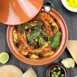 Vegetables are stewed in an aromatic tomato sauce until succulent and tender in this recipe for Simple Vegetable Tagine. Clay pot optional!