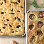 Olives, tomatoes, roasted veggies, herbs, or fruits...the topping possibilities are endless with this base recipe for Homemade Focaccia. And no kneading required!